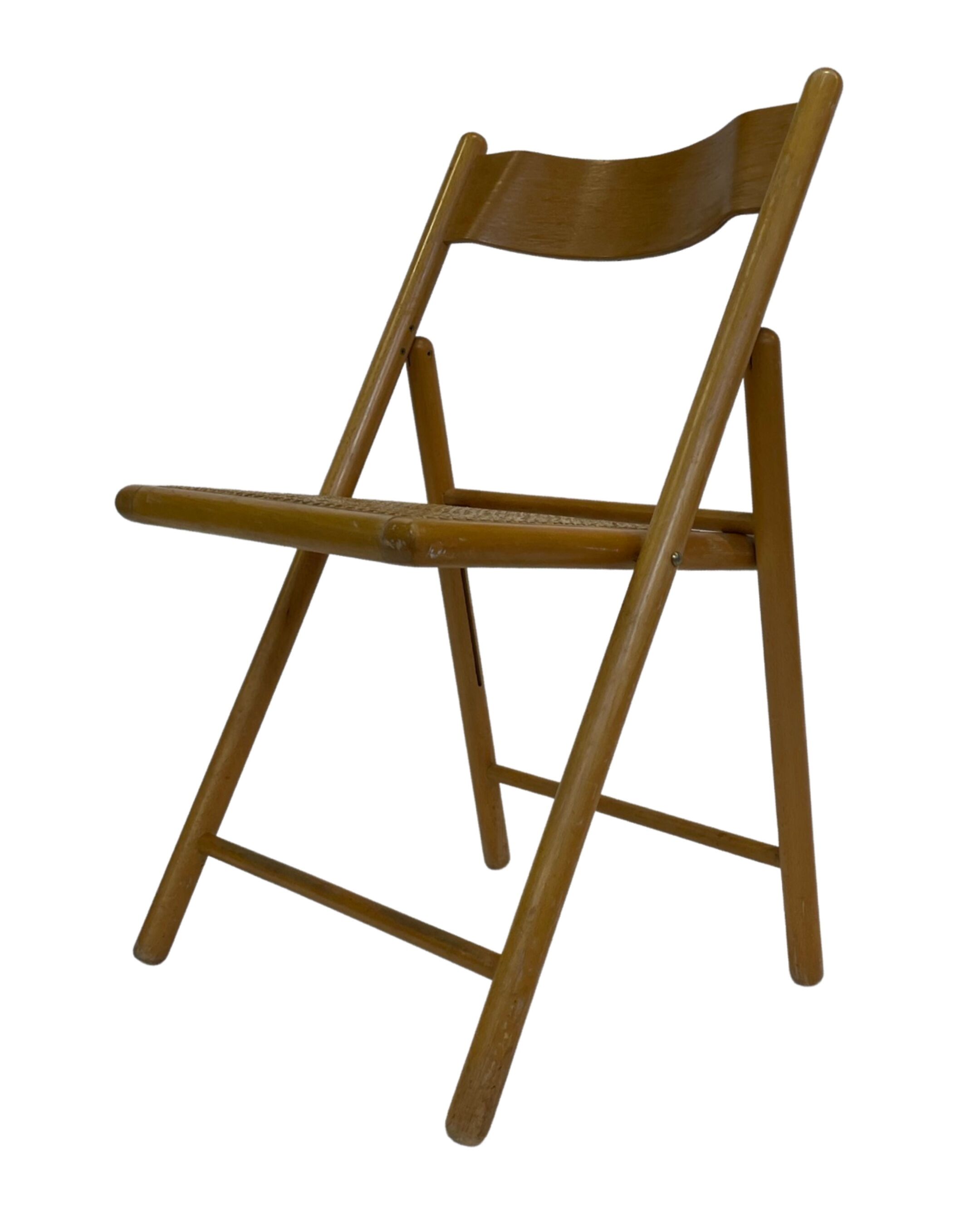 Set of four vintage folding chairs with webbing and wood 1970s