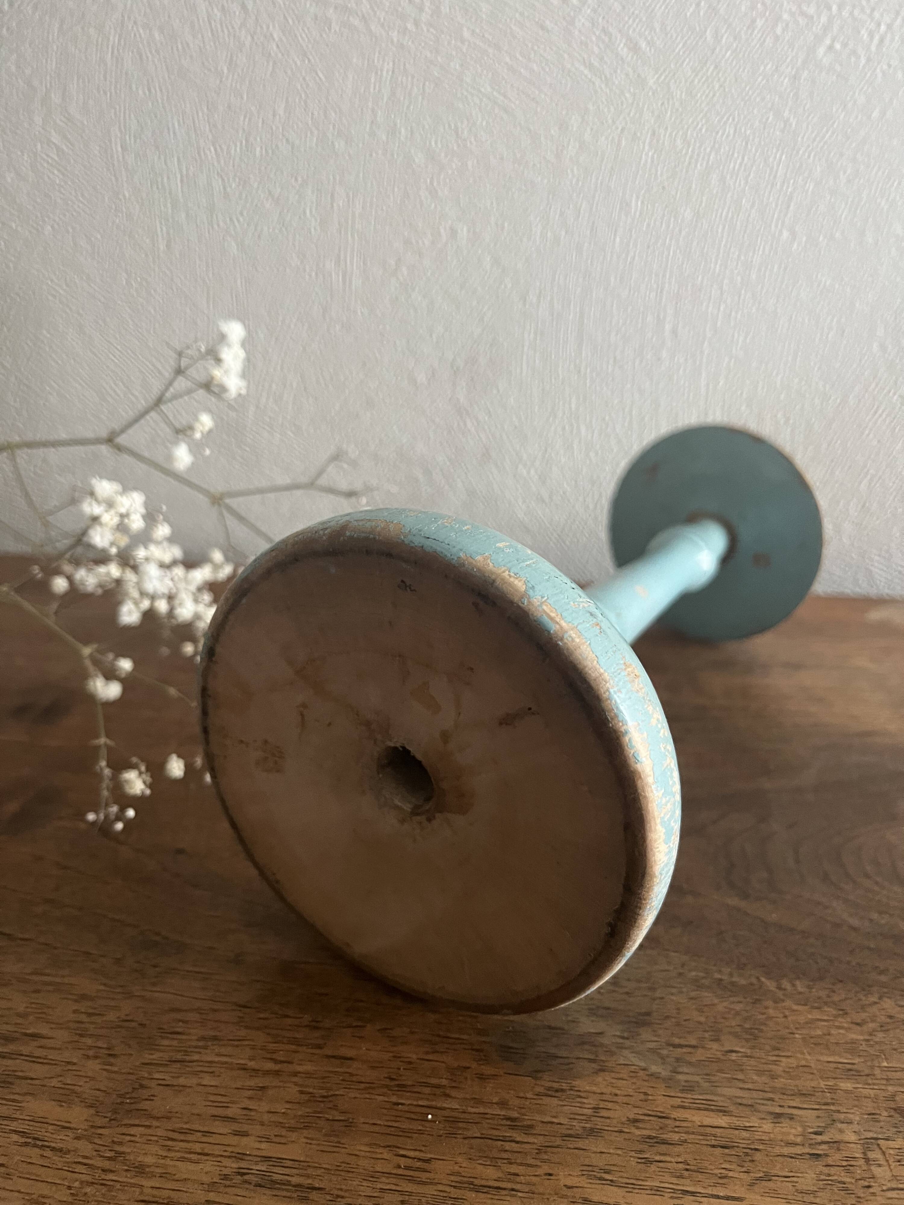 Weathered wooden hat rack