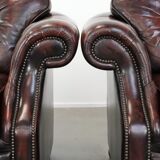 Set of two marbled cowhide leather Chesterfield armchairs in English style