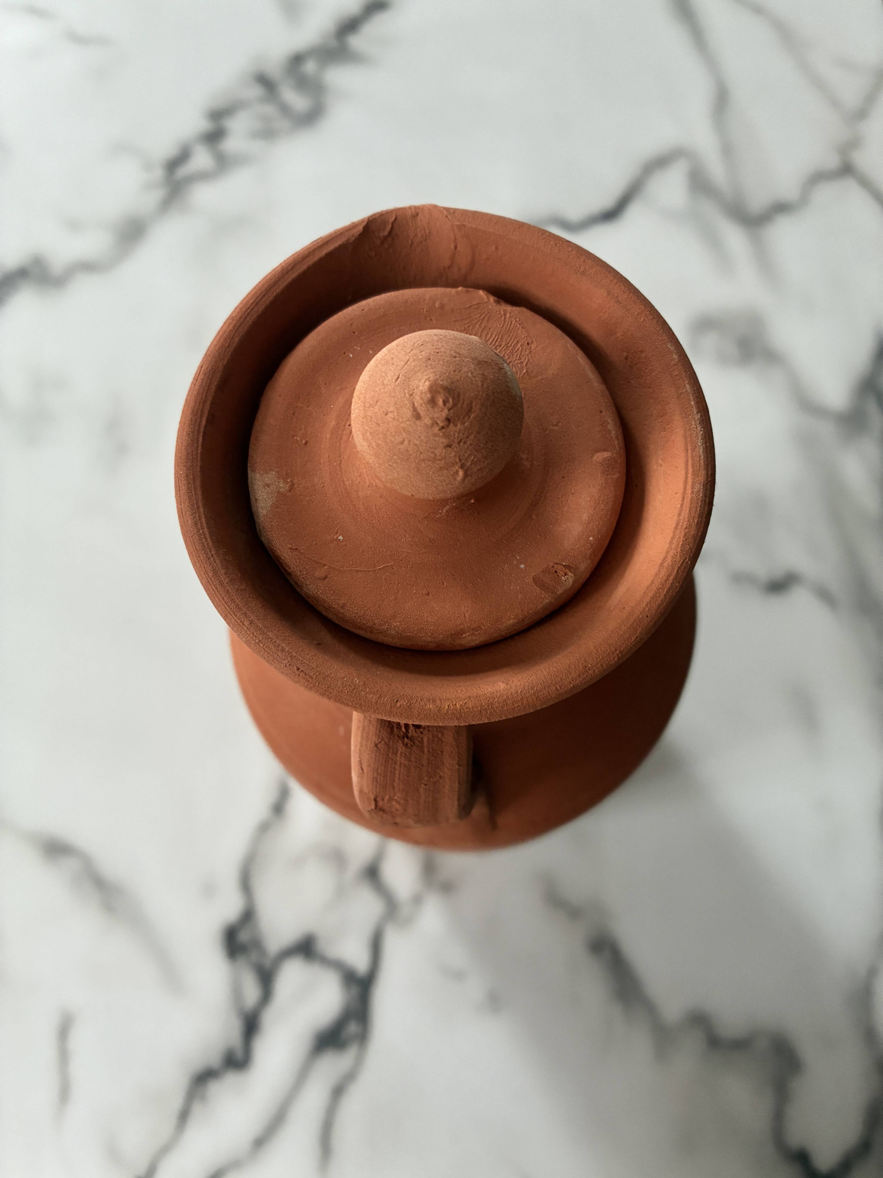 Raw terracotta pitcher
