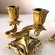 Pair of art nouveau design candlesticks in bronze
