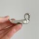 set of 6 metal knife holders in the shape of a swan,