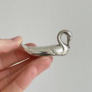 set of 6 metal knife holders in the shape of a swan,