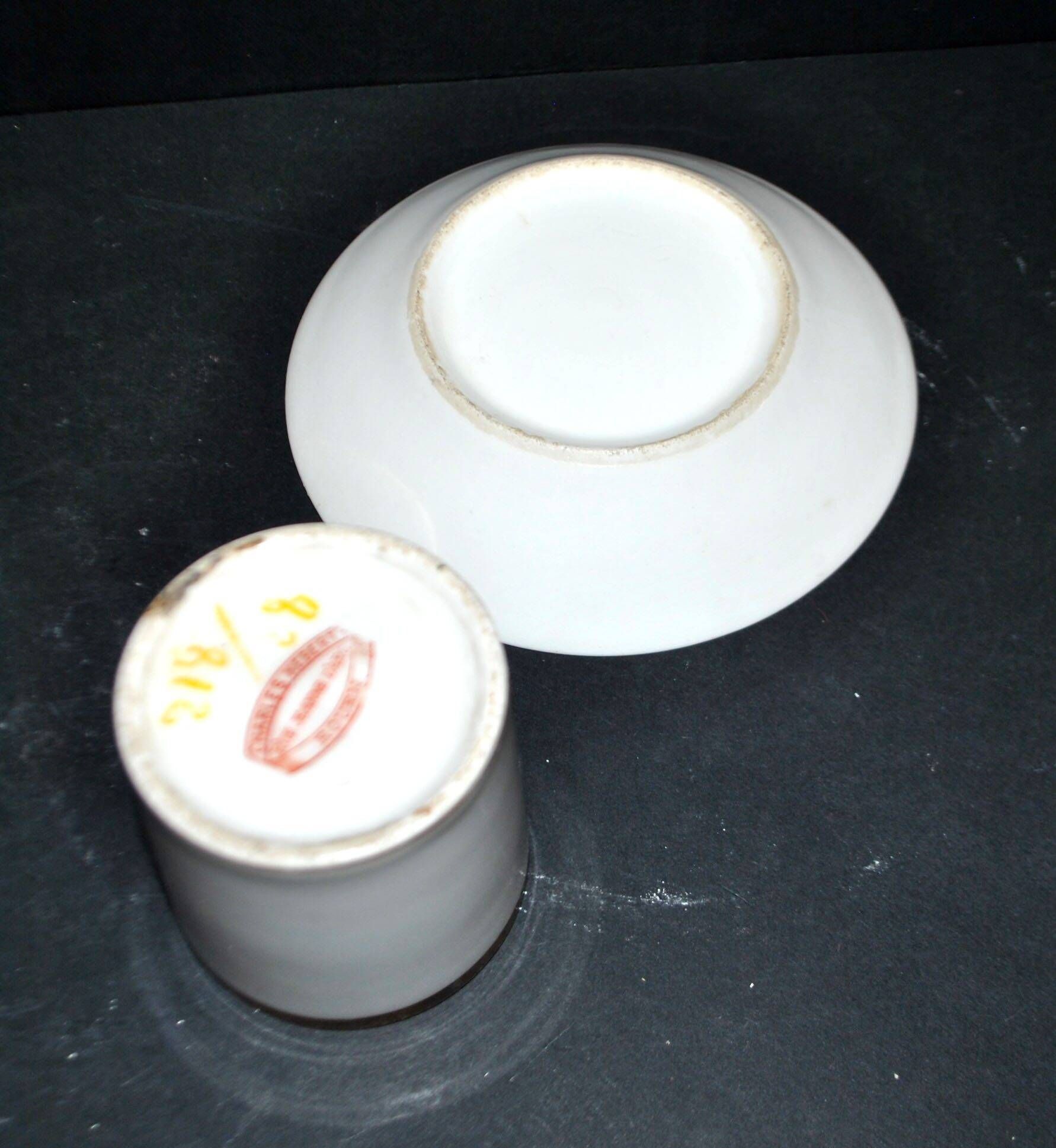Charles Hebert Rouen porcelain – Antique litron coffee cup with gold trim.