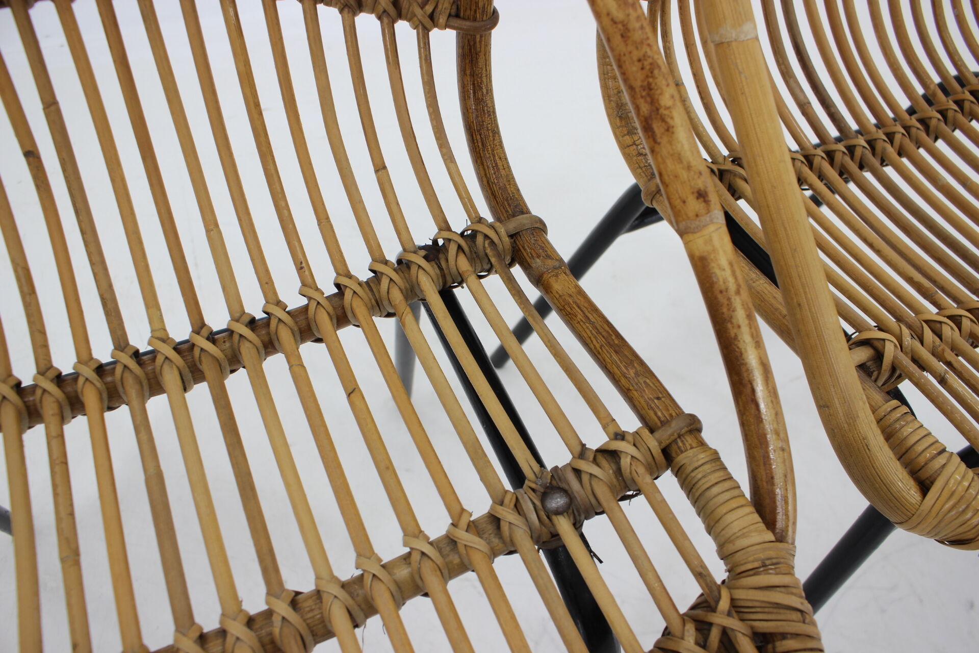 1970s pair of Alan Fuchs rattan and iron lounge chairs, Czechoslovakia