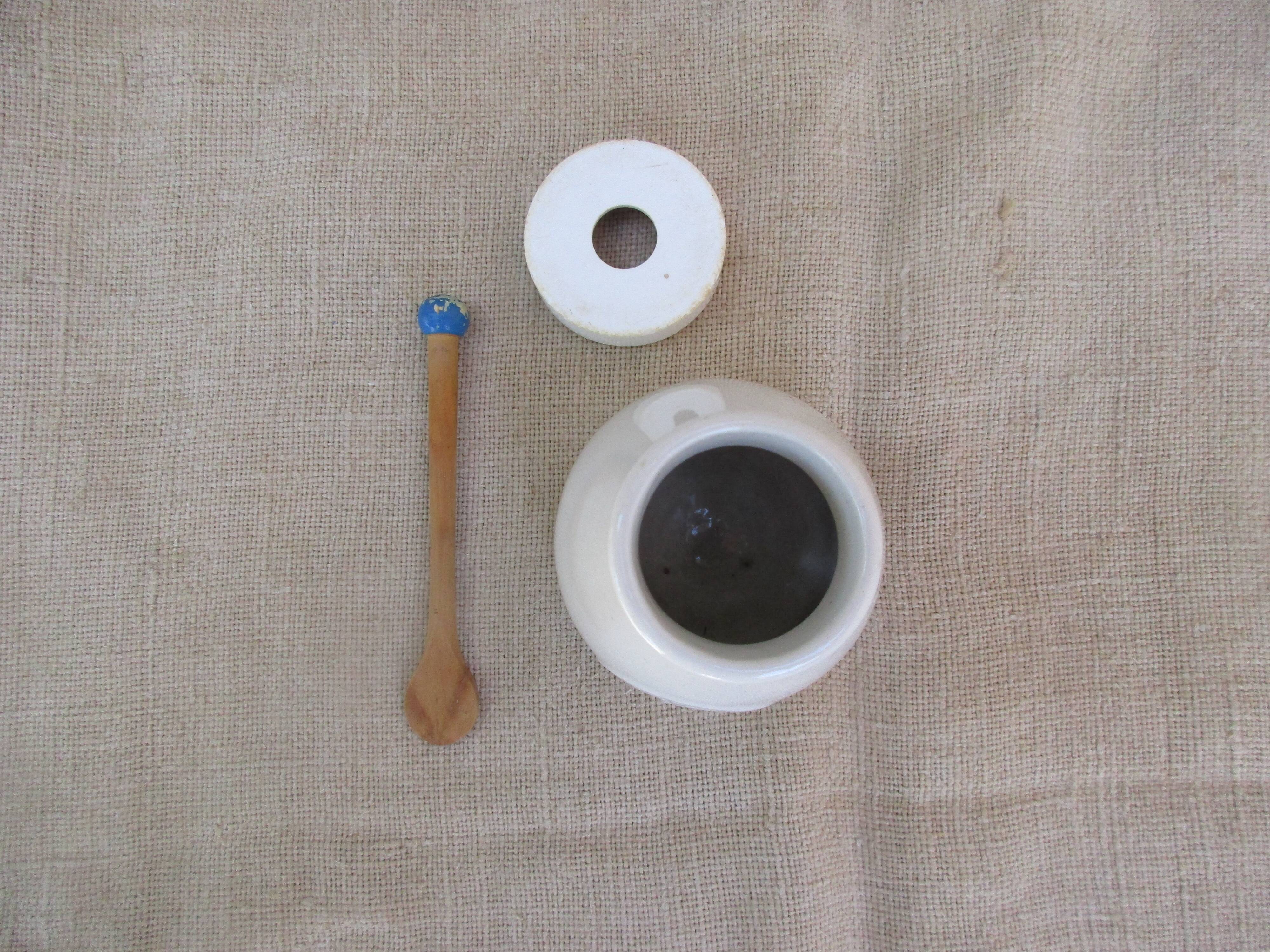 Old mustard pot in gres