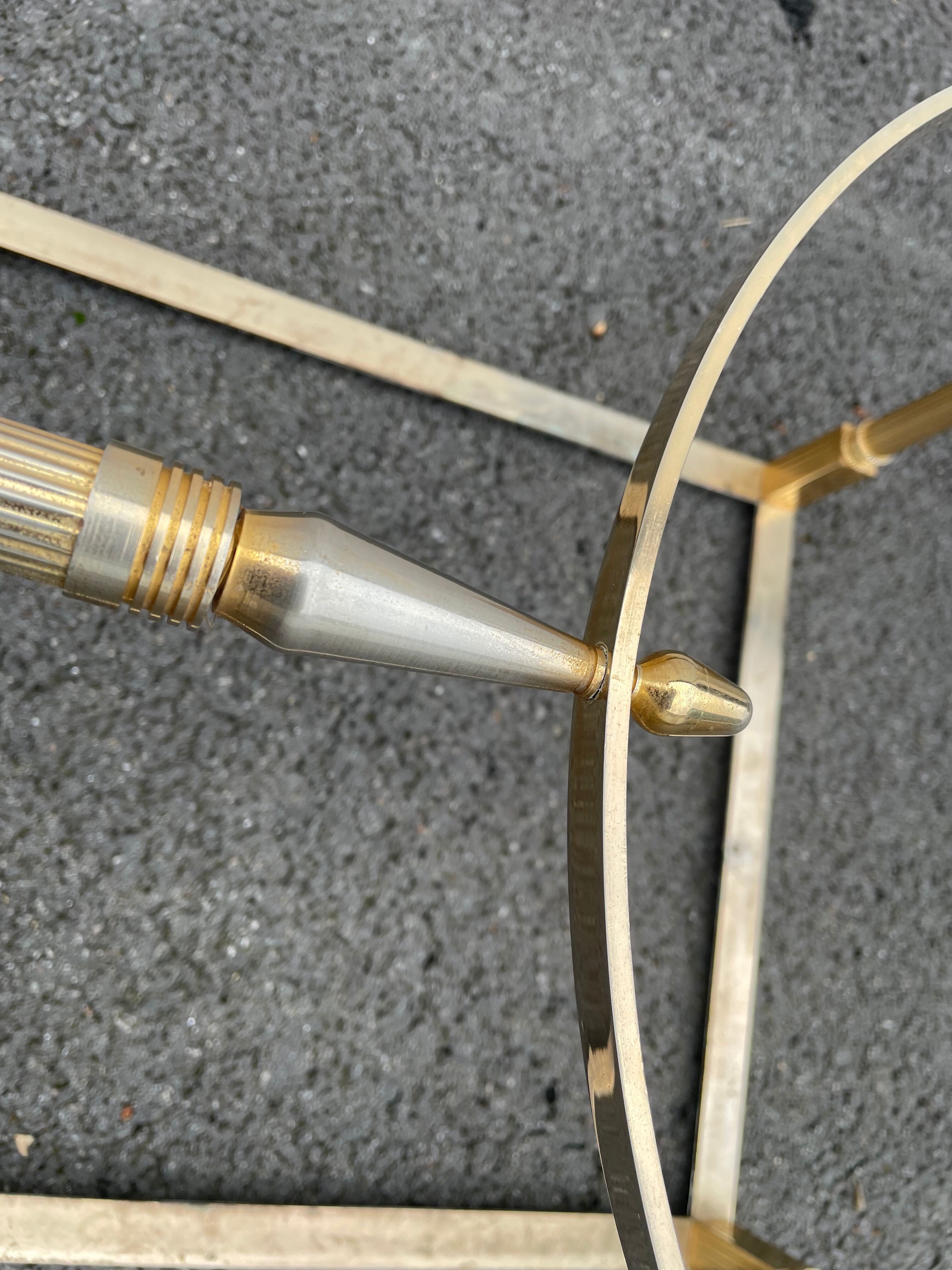 Coffee table in gilded brass and veined green marble