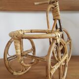 Rattan tricycle plant door