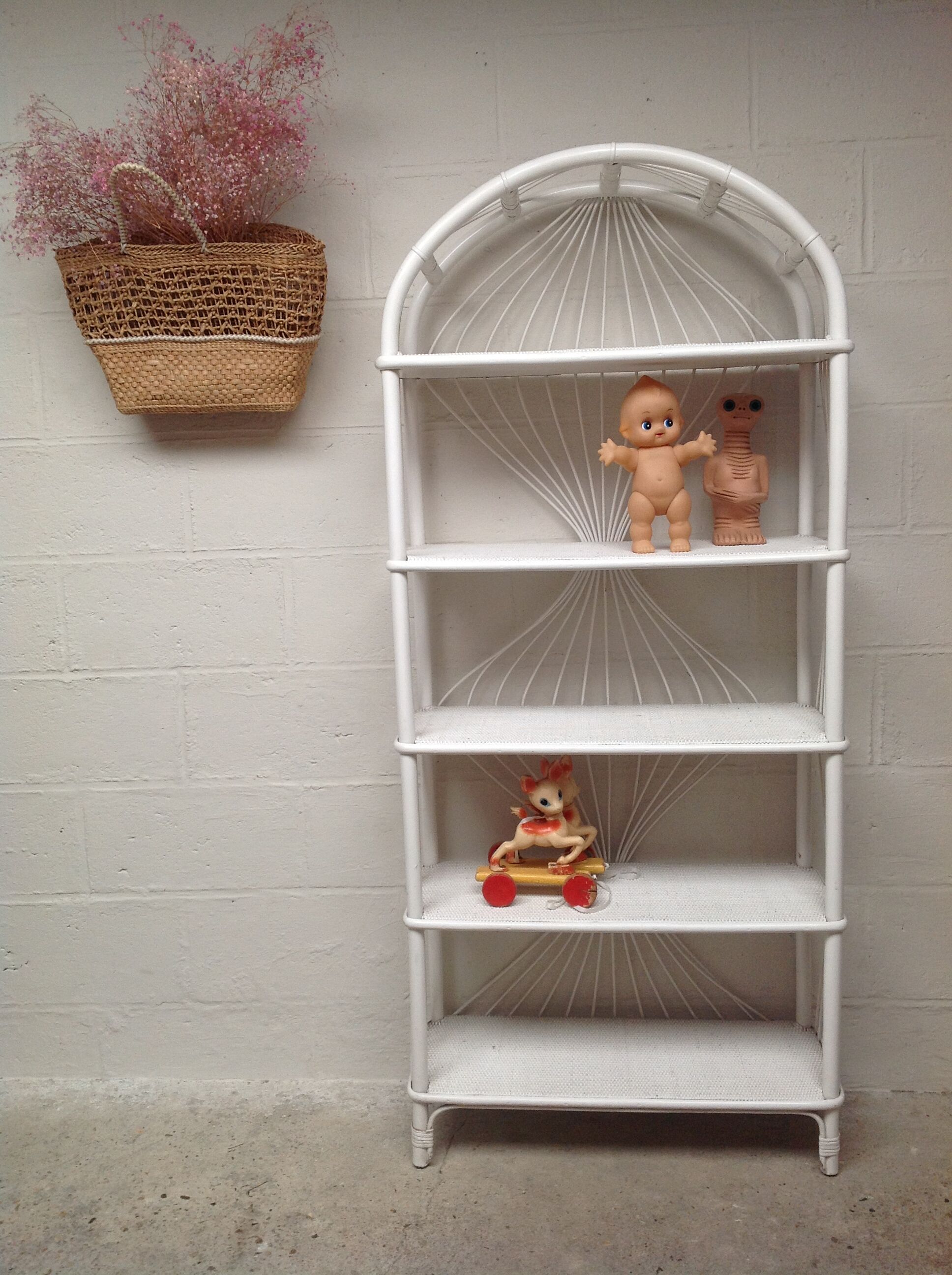 White lacquered rattan bookcase