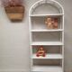 White lacquered rattan bookcase