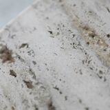 Circular travertine coffee table