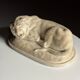 Marble sculpture of a reclining lion