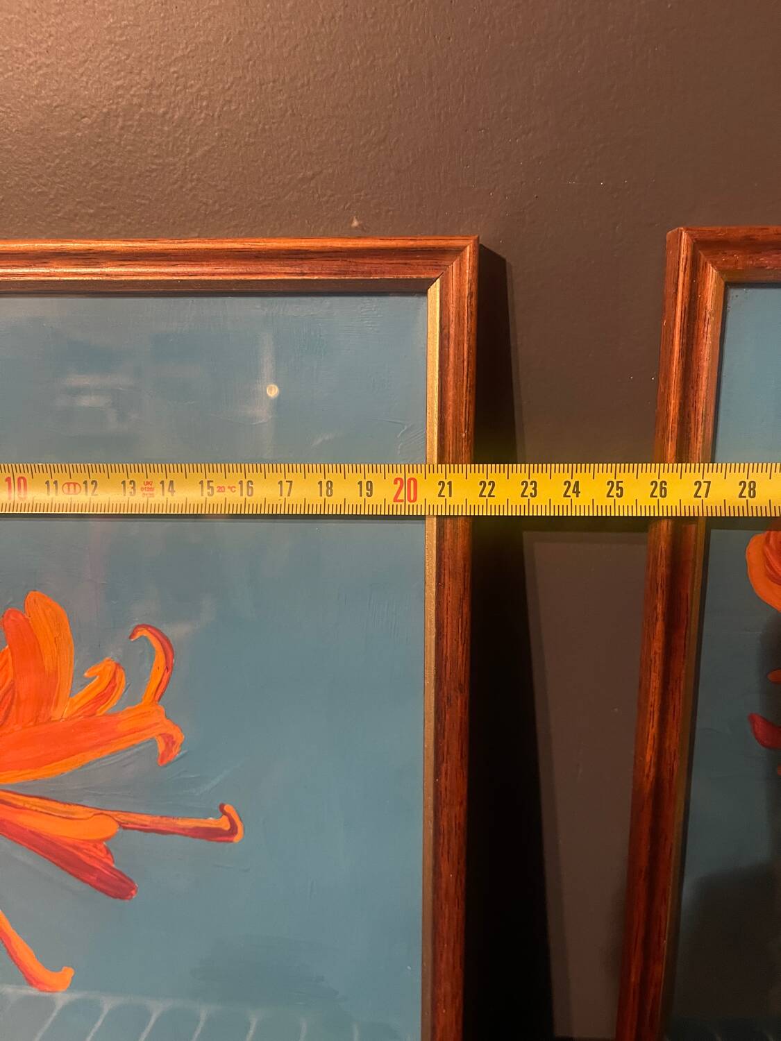 2 paintings of orange dahlias in antique wooden frames