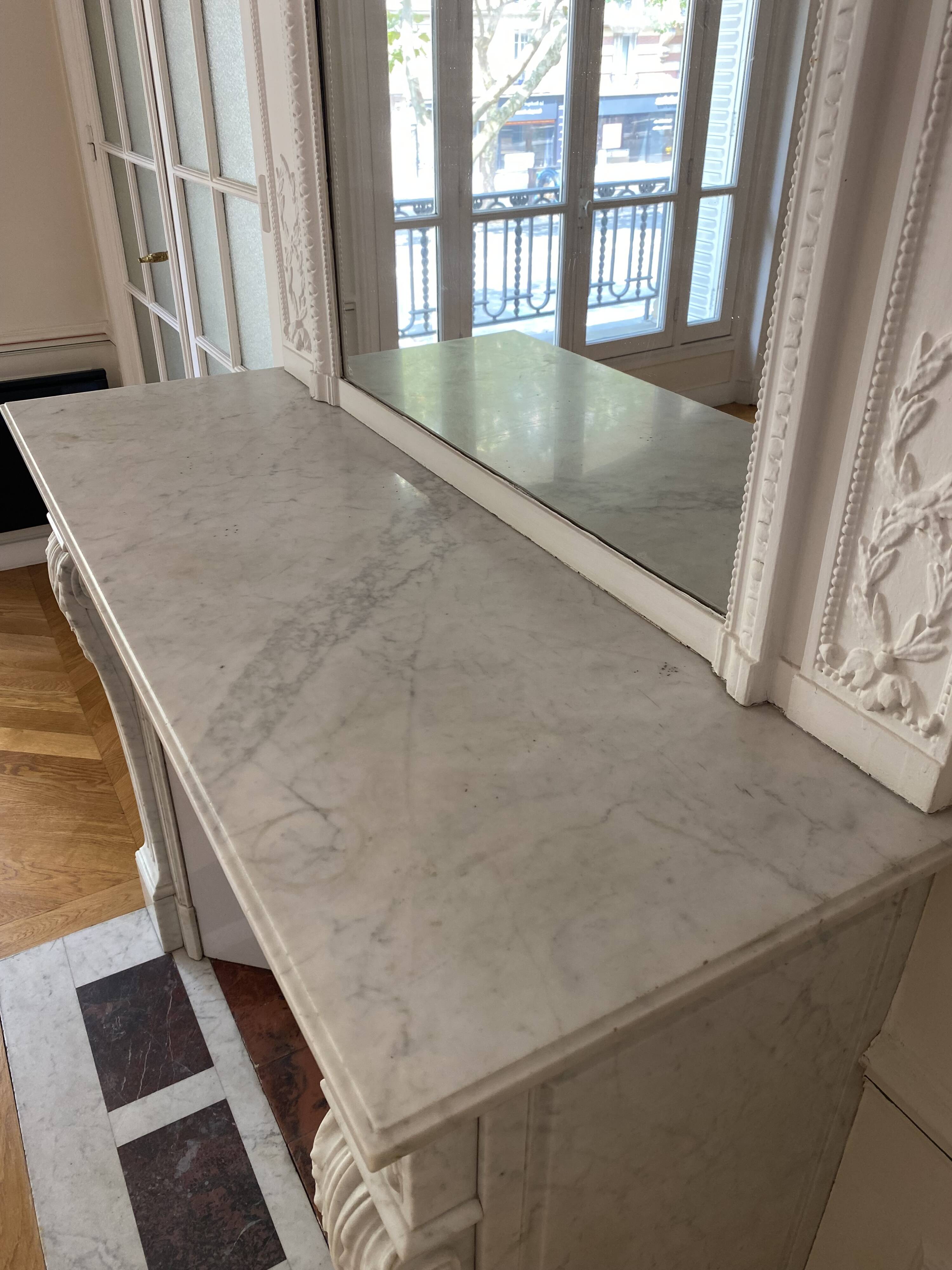 Antique marble fireplace with overmantel and mirror - Haussmannian apartment