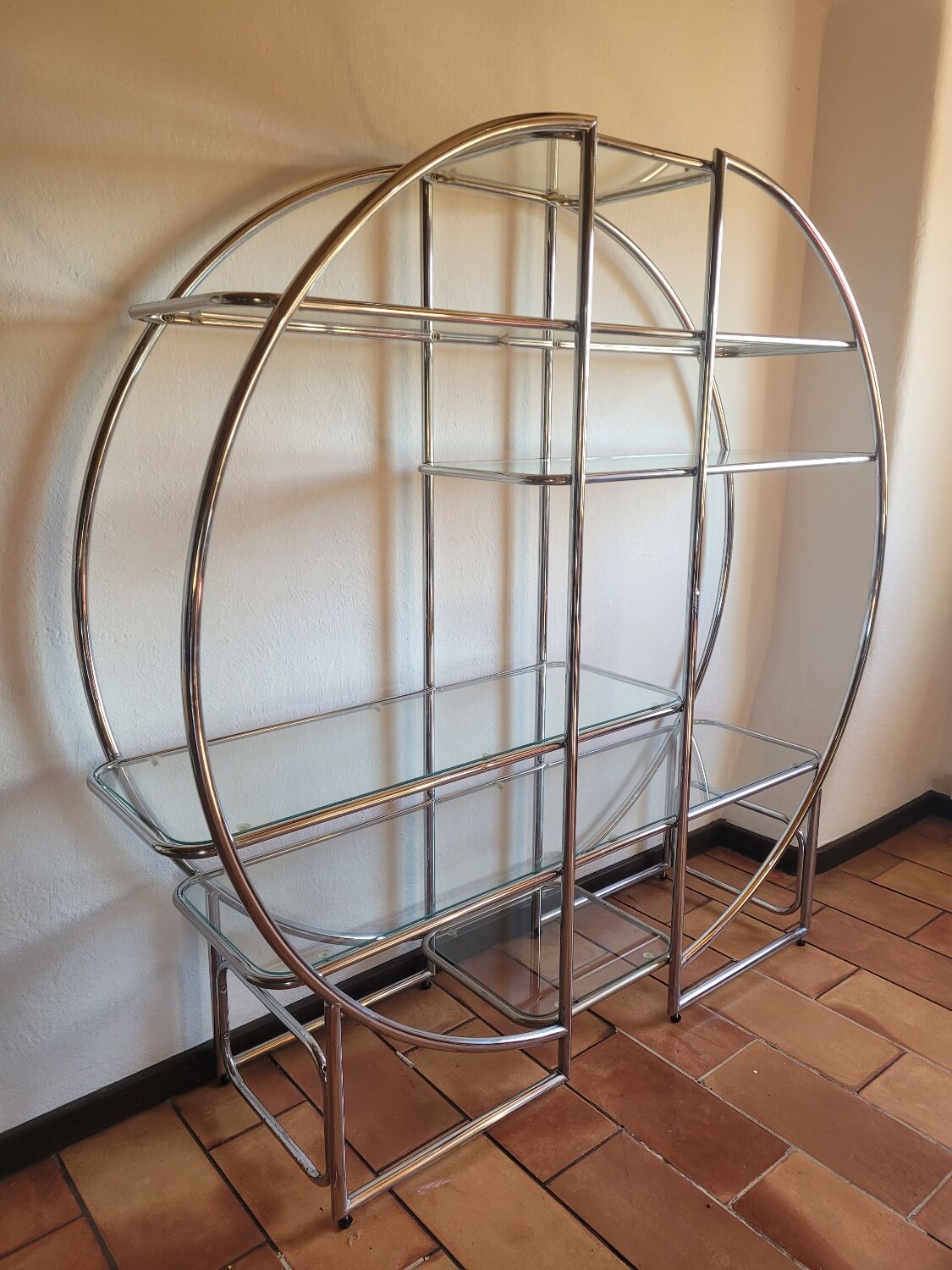 Bauhaus-style chrome round shelf