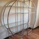 Bauhaus-style chrome round shelf