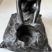 Art Nouveau spelter bookends, depicting an oriental woman, circa 1900