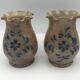 Pair of vintage pottery vases with floral decoration and glaçureau sel