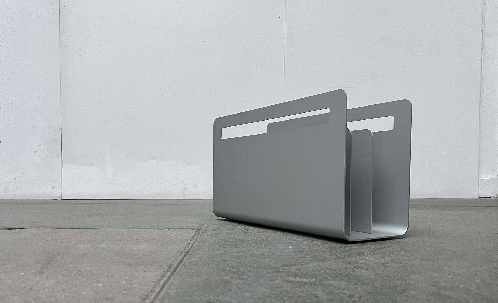 Minimalist aluminium magazine rack by Norman Foster for Helit, Germany, 1990s.