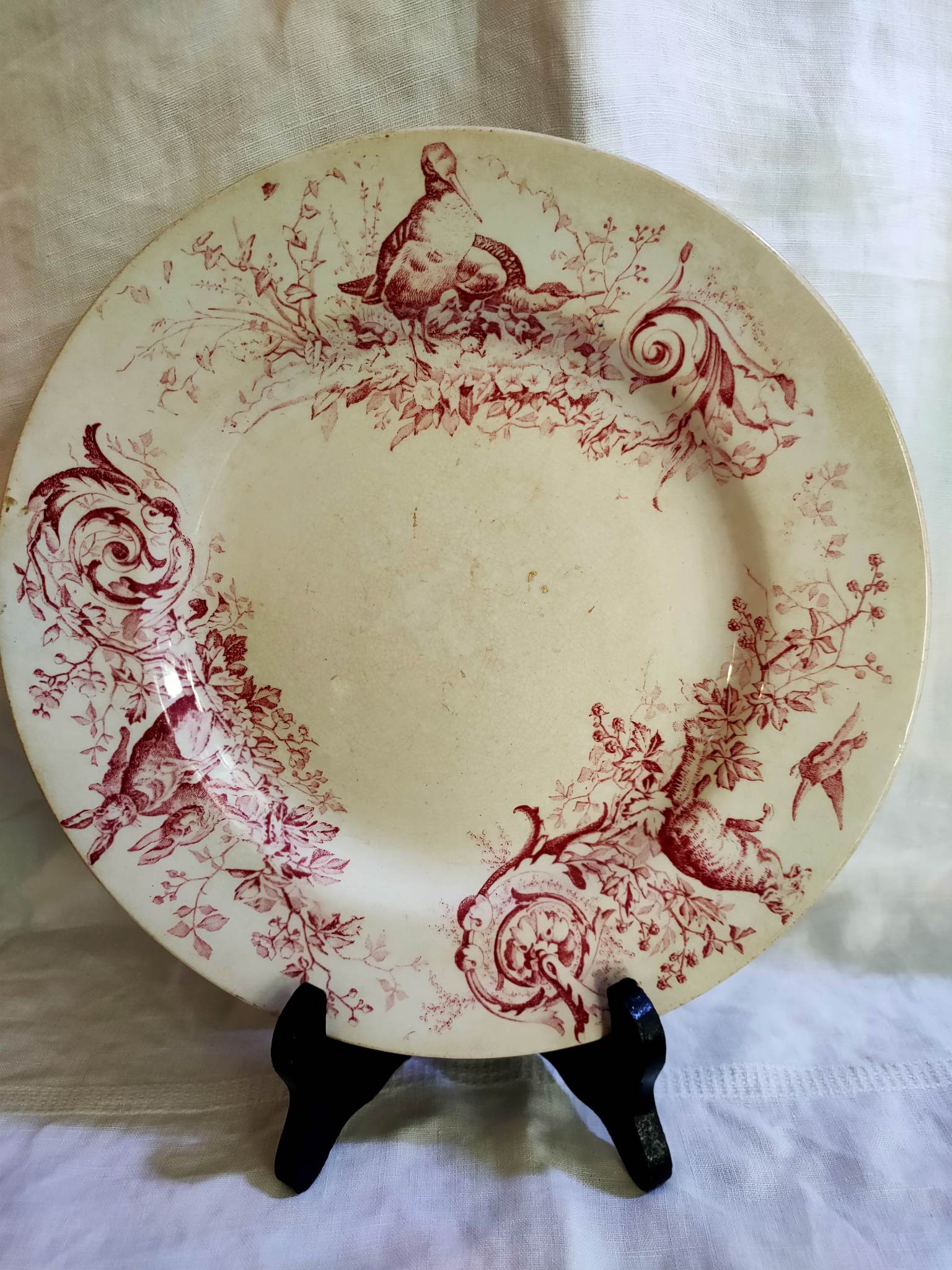 Assiette plate terre de fer faïence de Lunéville K/G