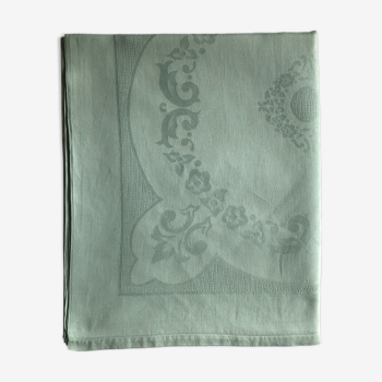 Old damask tablecloth tinted in pastel green