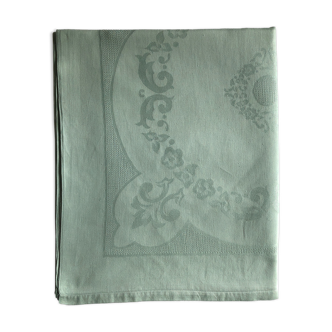 Old damask tablecloth tinted in pastel green