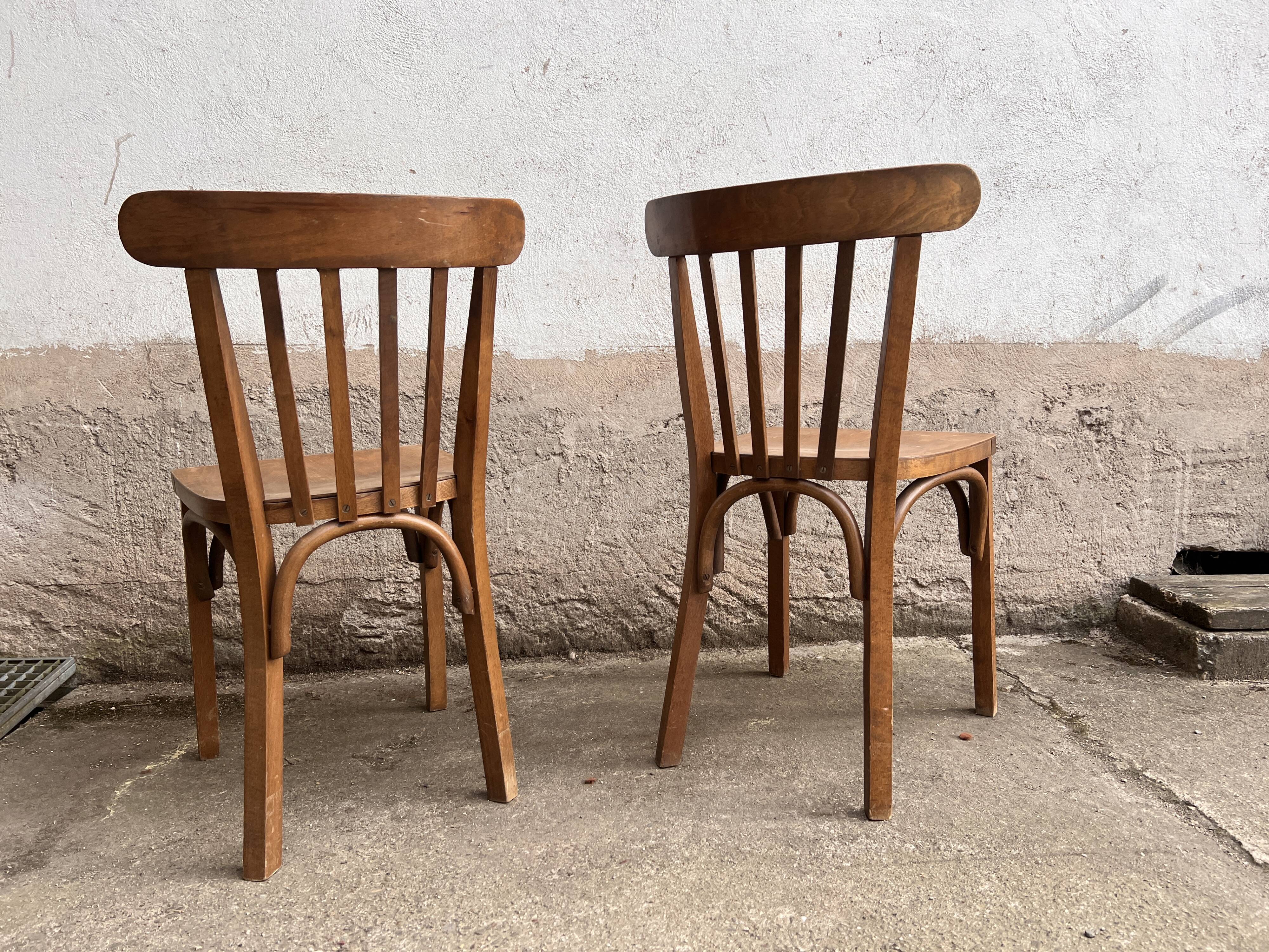 Pair of vintage wooden bistro chairs