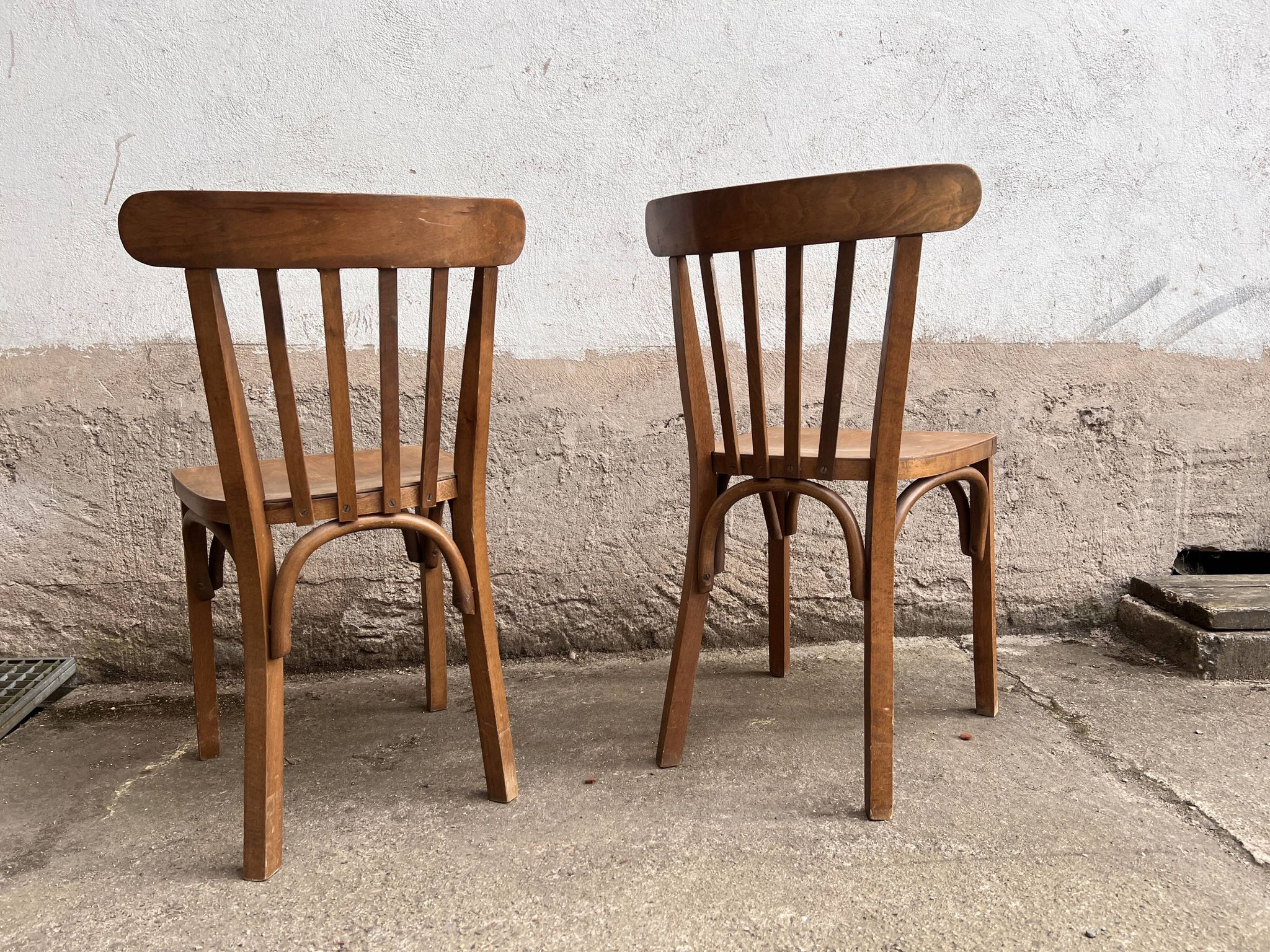 Pair of vintage wooden bistro chairs