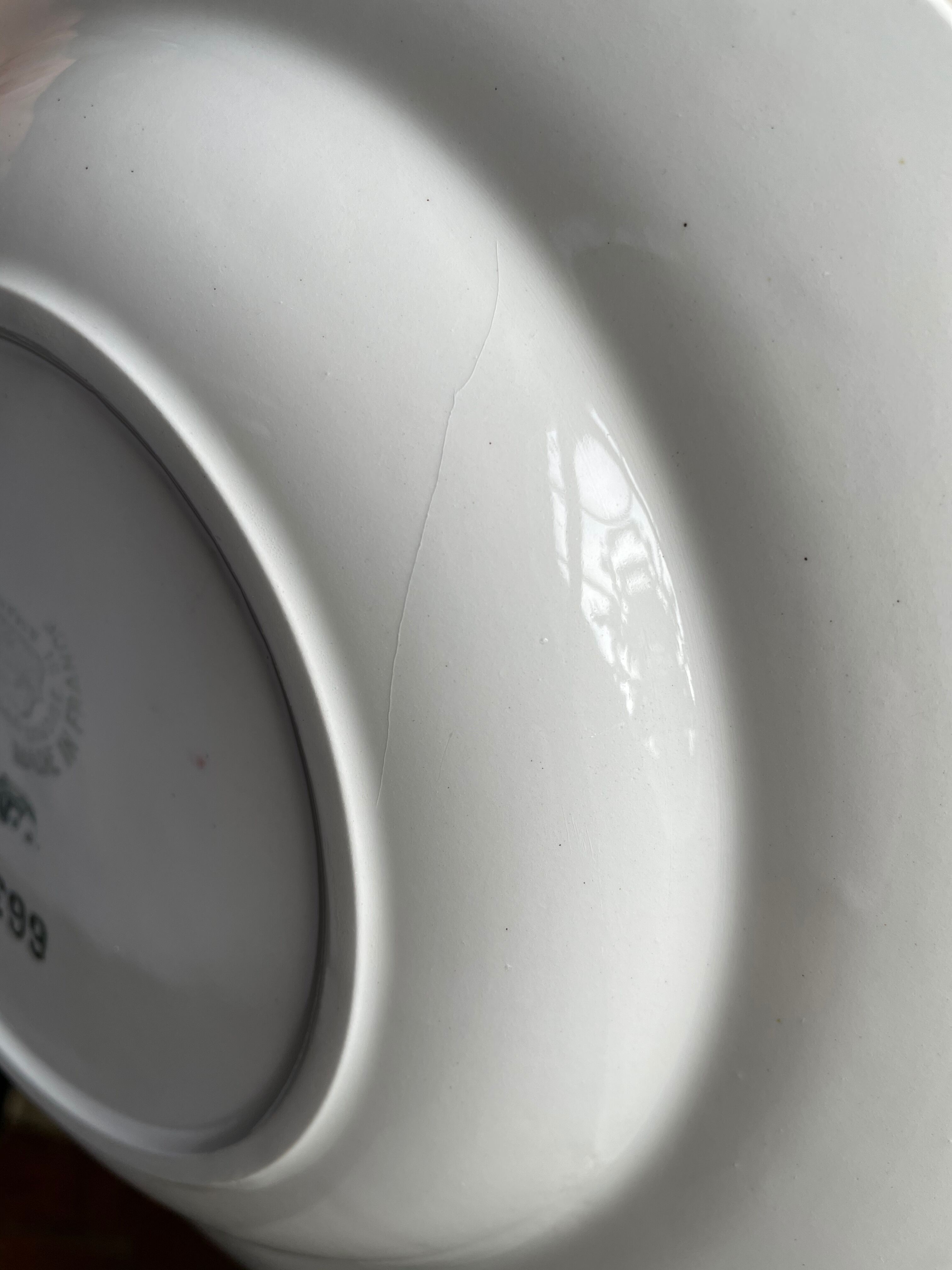 Saint Amand hollow plates decorated with red and blue flowers