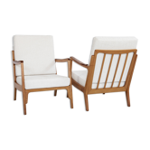 Midcentury Danish pair of easy chairs in oak and teak with white fabric 1960s