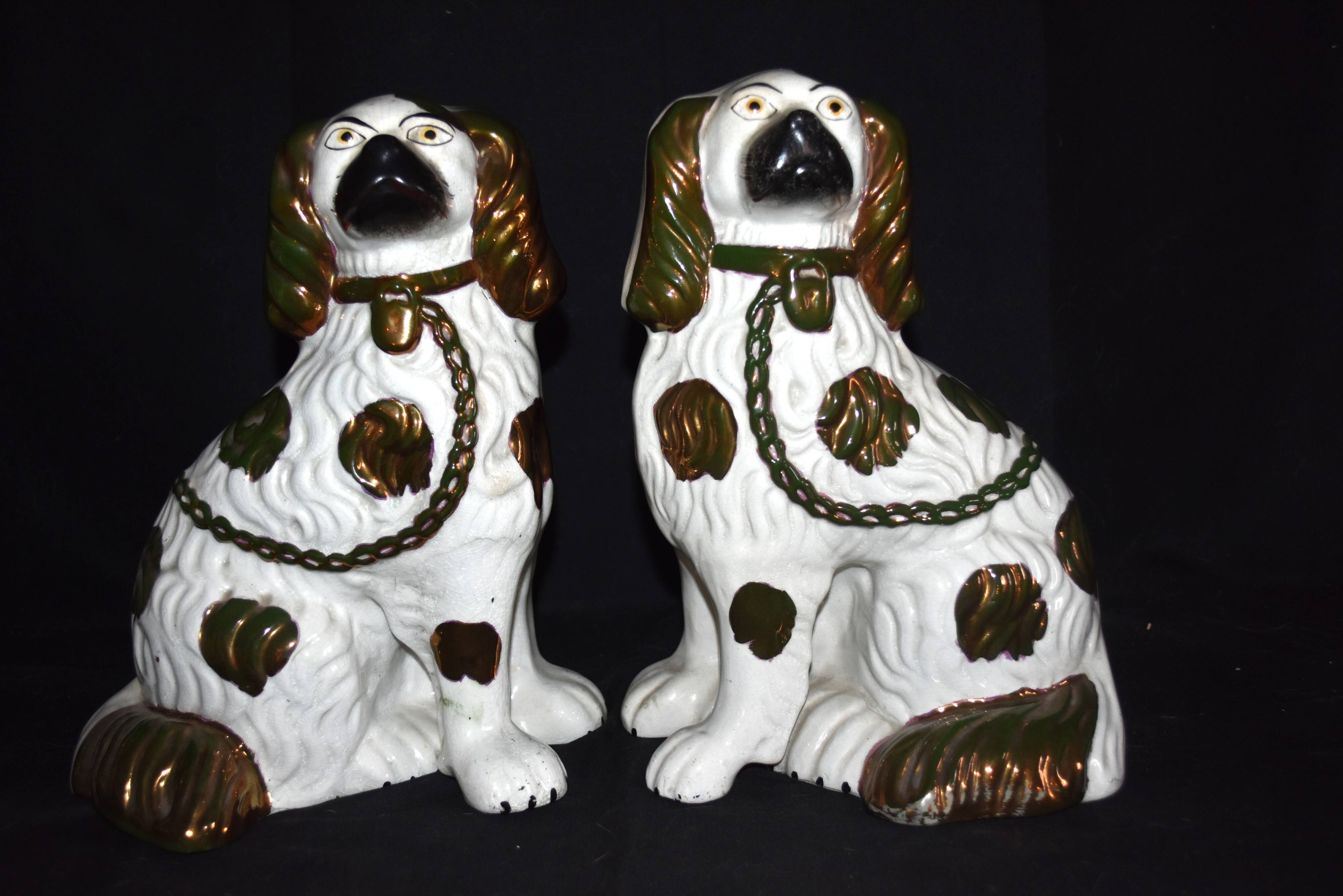 Pair of earthenware dogs (cavalier king charles)
