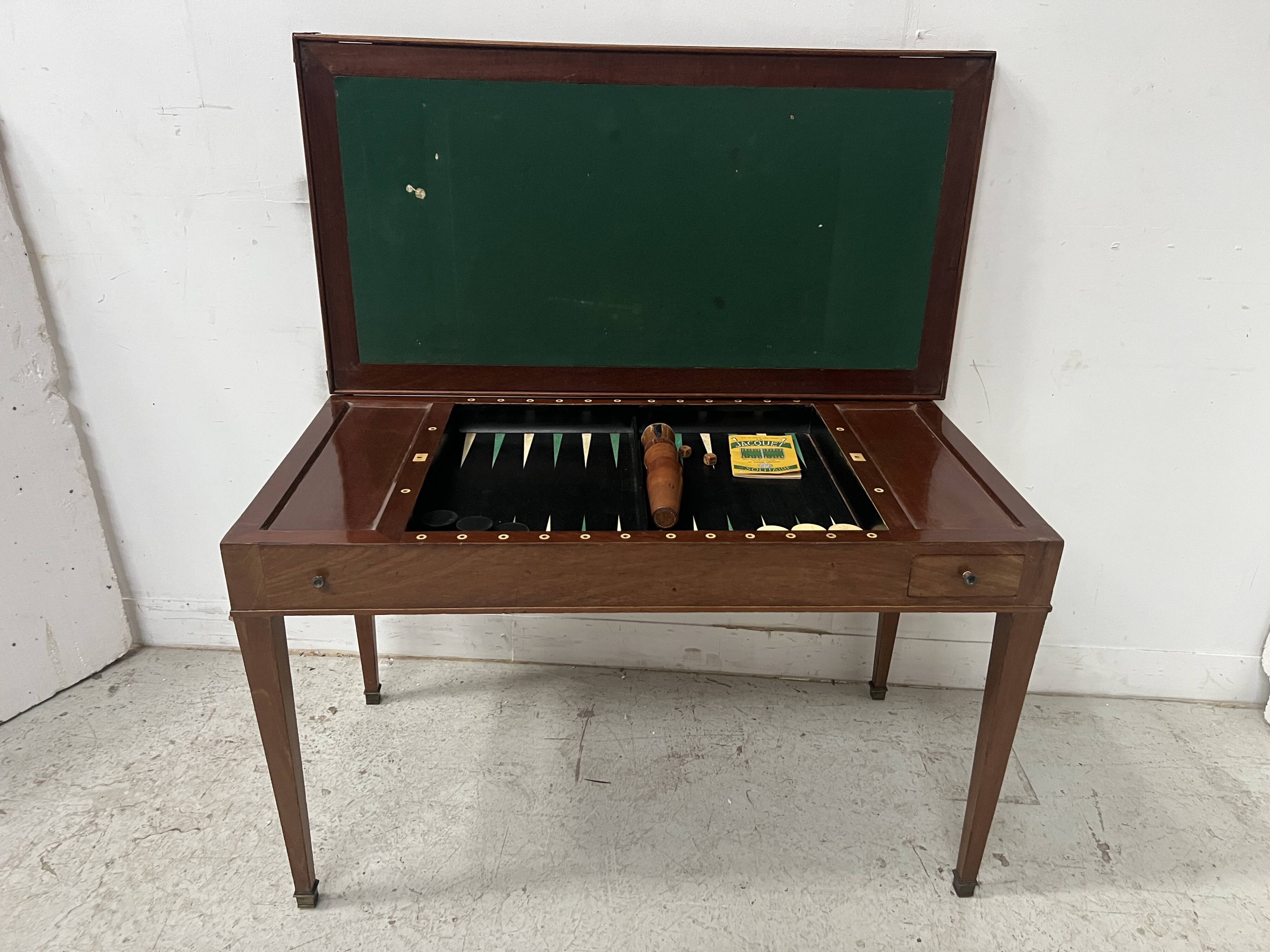 Louis XVI period "Tric Trac" gaming table in 18th century mahogany.
