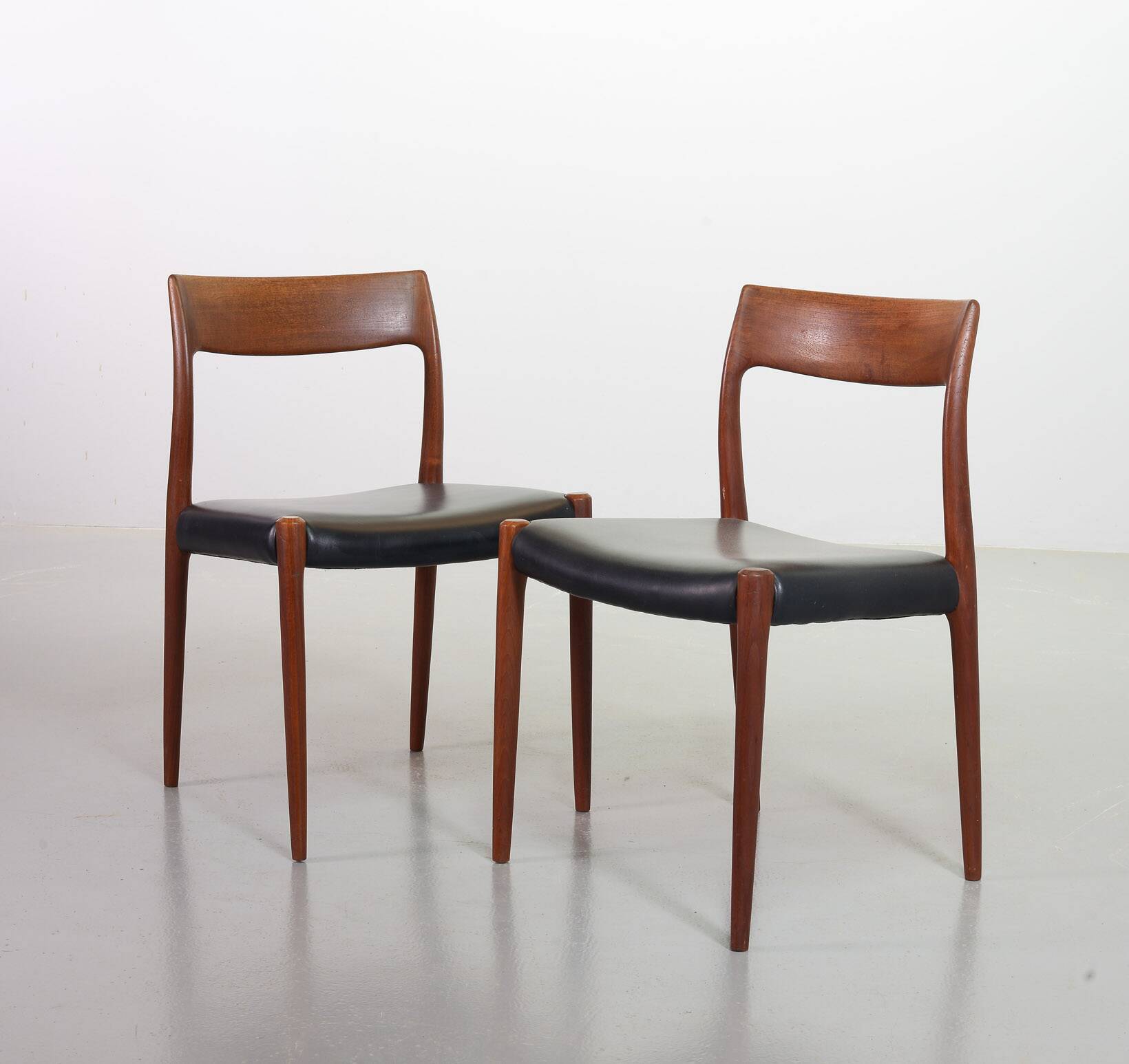 Niels Otto Moller Teak Wooden with Black Leather Dining Chairs, Model 77