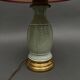 Napoleon III lamp in green cecidon on a brass base