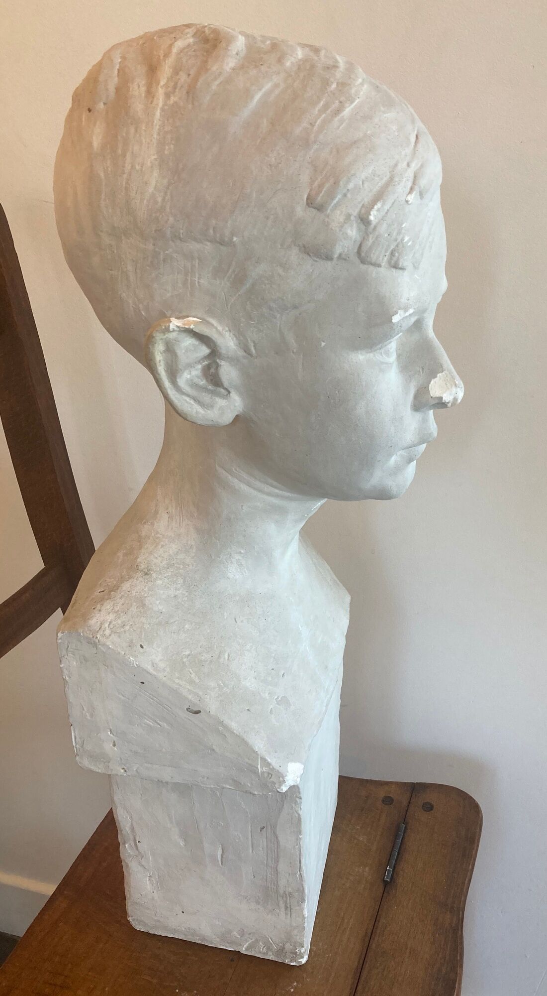 Bust portrait of a child in plaster signed René Pajot for his friend Louis Palacio