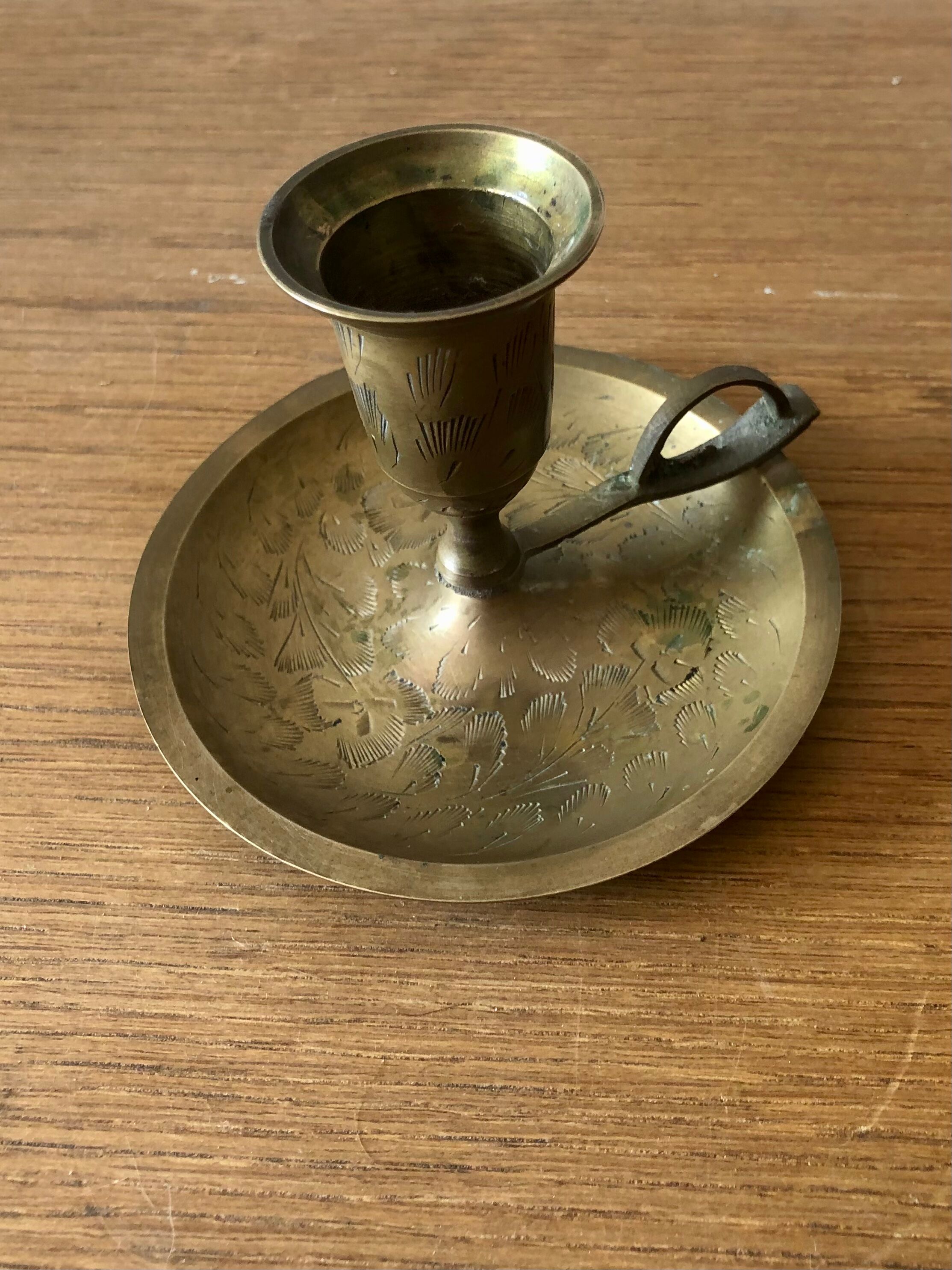 Brass hand candle holder