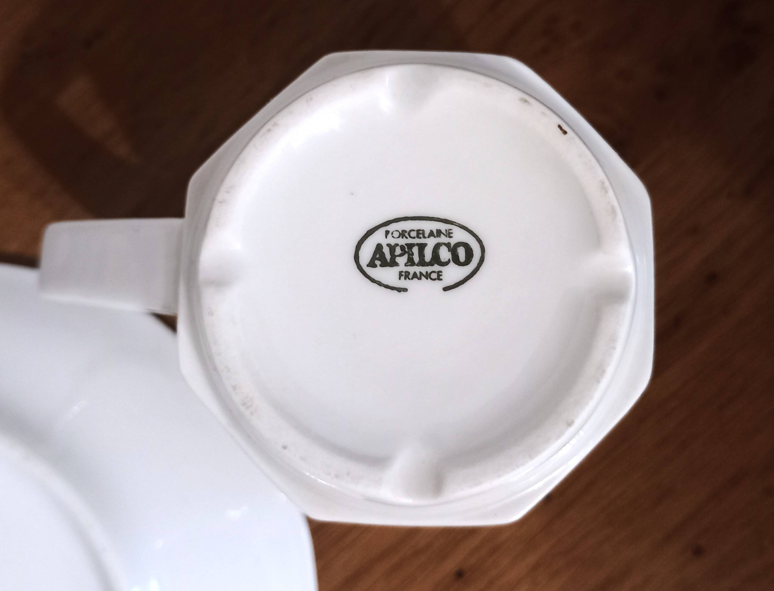 Set of 4 white porcelain cups from Apilco + saucers