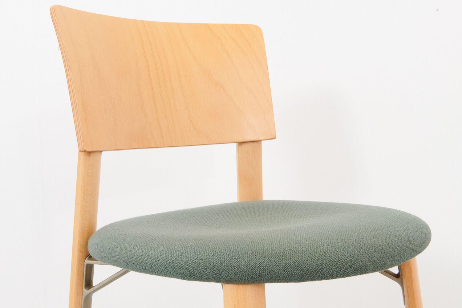 Kusch &Co chair made of wood and green fabric