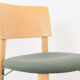 Kusch &Co chair made of wood and green fabric