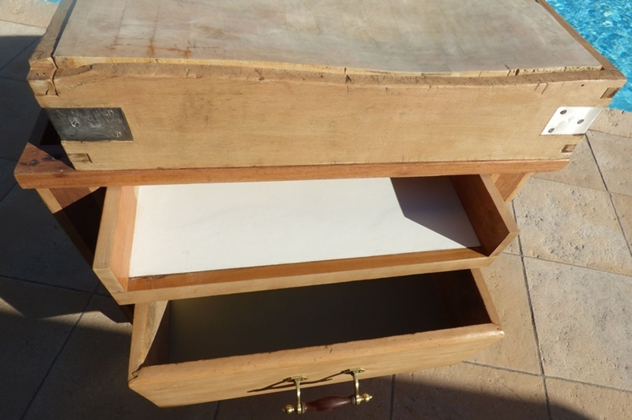Butcher's log cabinet with two drawers and location for kitchen utensils
