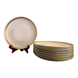 8 flat porcelain plates from Limoges Bernardaud, gilded Greek decoration, twentieth century