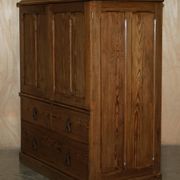 Antique Victorian pine governess buffet with sliding shelf.