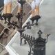 Pair of 19th-century bronze cathedral wall sconces with 5 lights