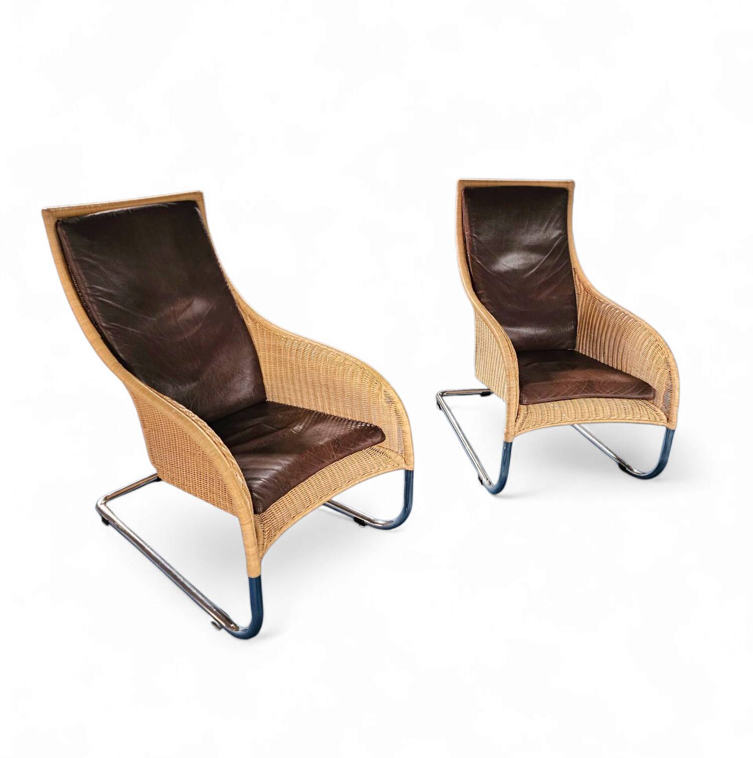 2 x Weighty rattan lounge chair / brown leather 1990s  Very good condition