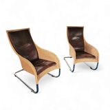 2 x Weighty rattan lounge chair / brown leather 1990s  Very good condition