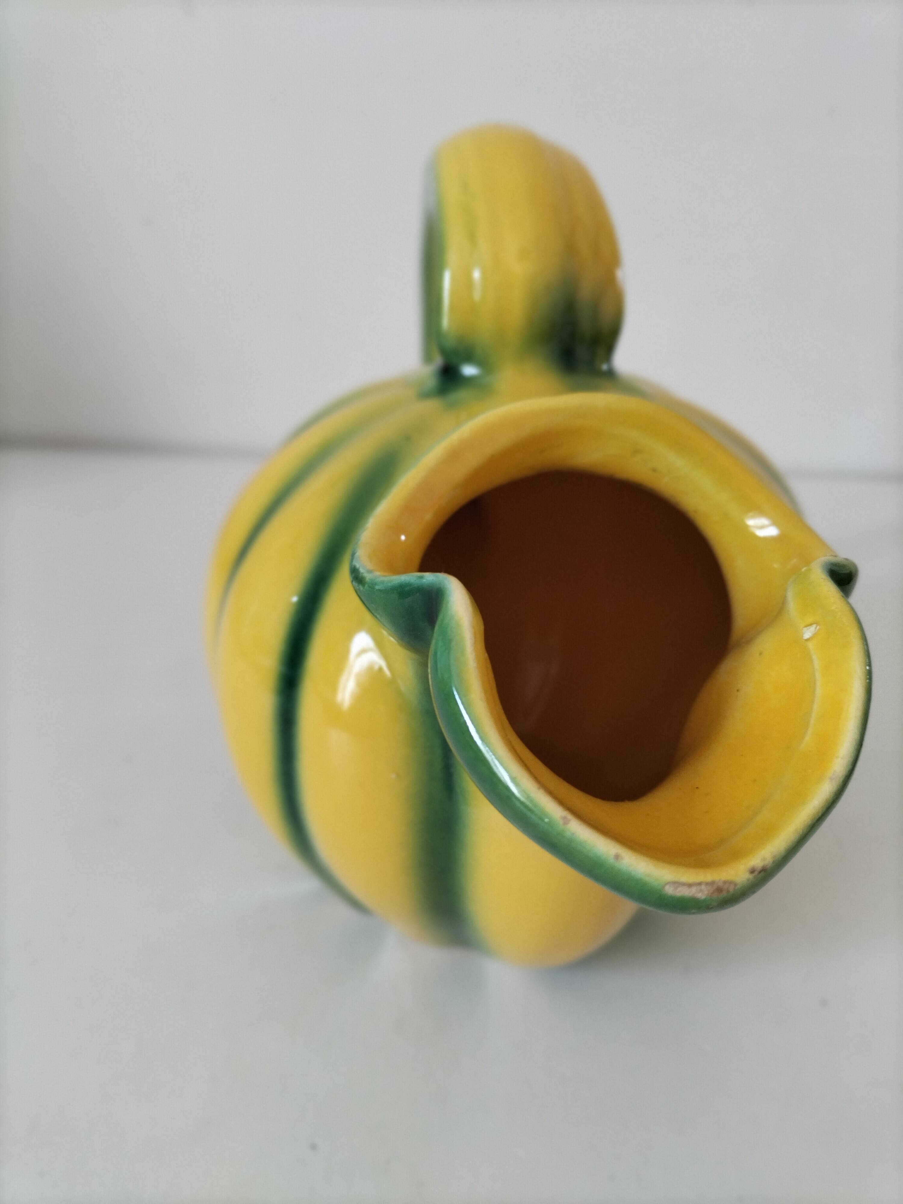 Jug melon in yellow and green majolica