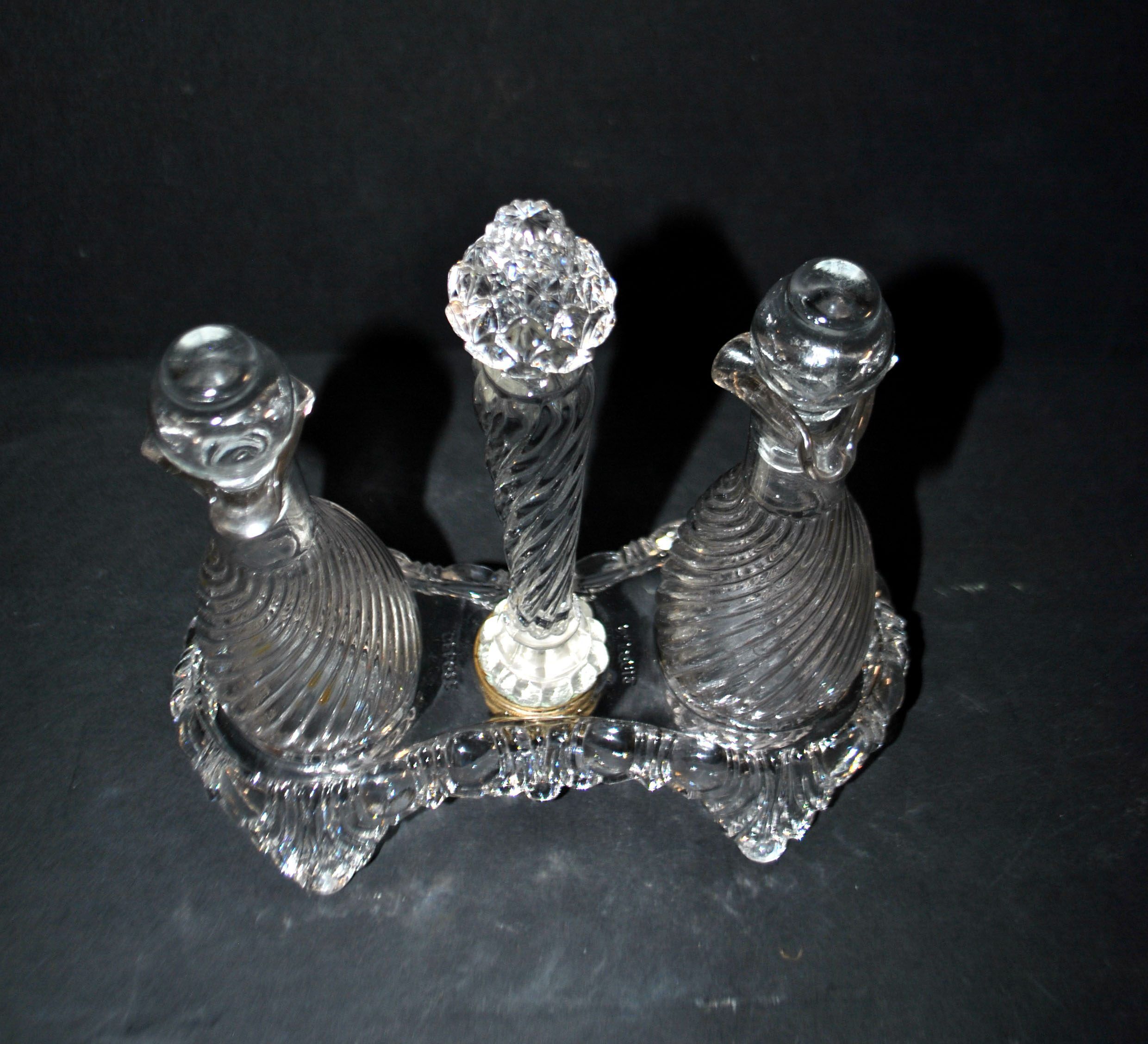 Antique oil and vinegar set in moulded crystal with bamboo torso, signed Saint-Louis, registered 1900.