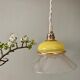 Vintage lampshade ride in yellow and transparent glass