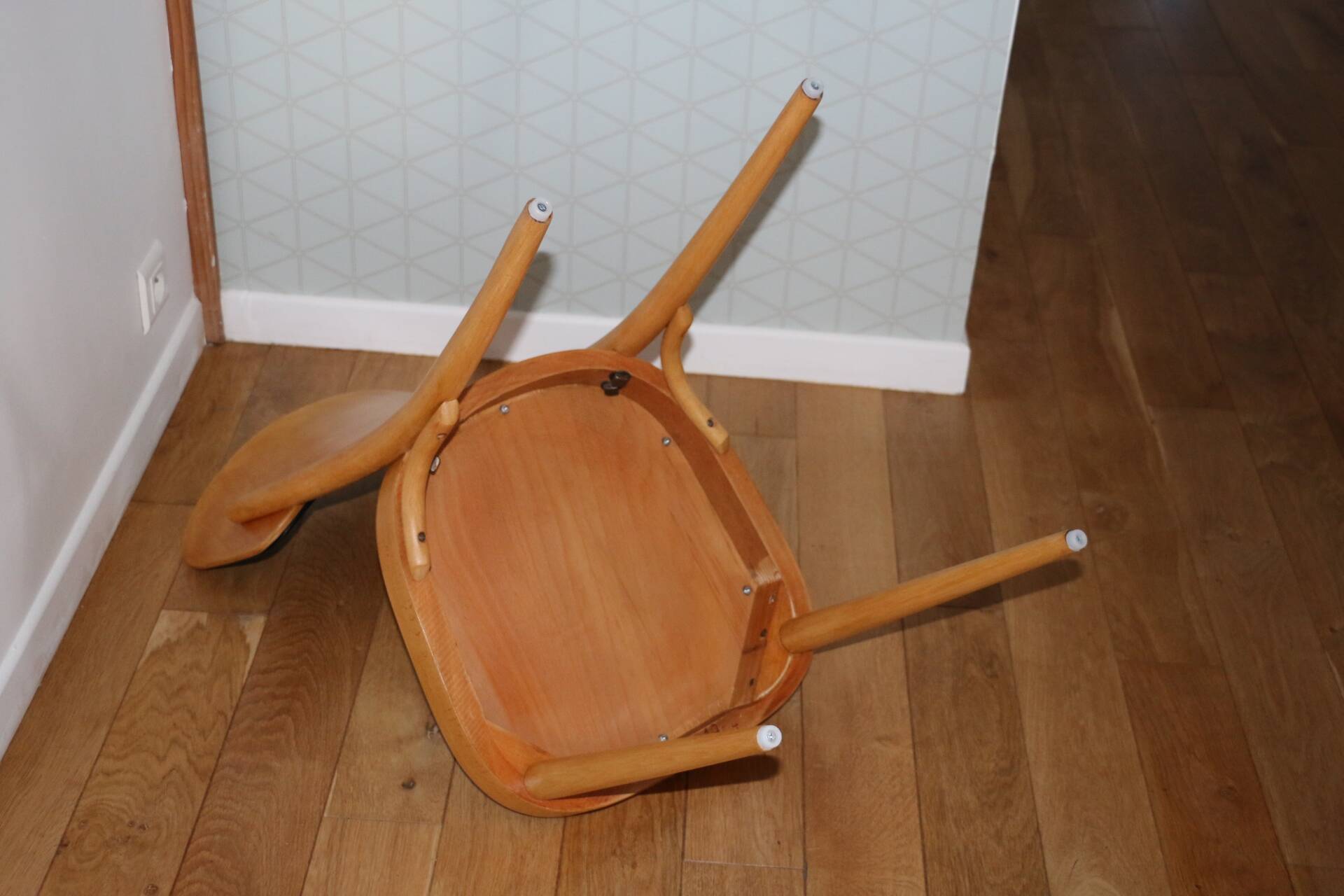 5 baumann chairs with large backs in black faux leather.