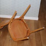 5 baumann chairs with large backs in black faux leather.